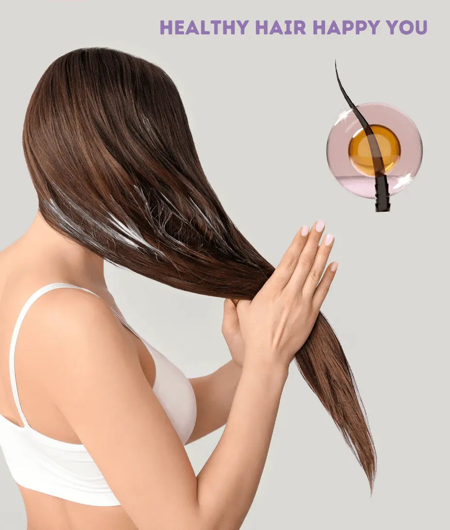 Lady applying hair oil